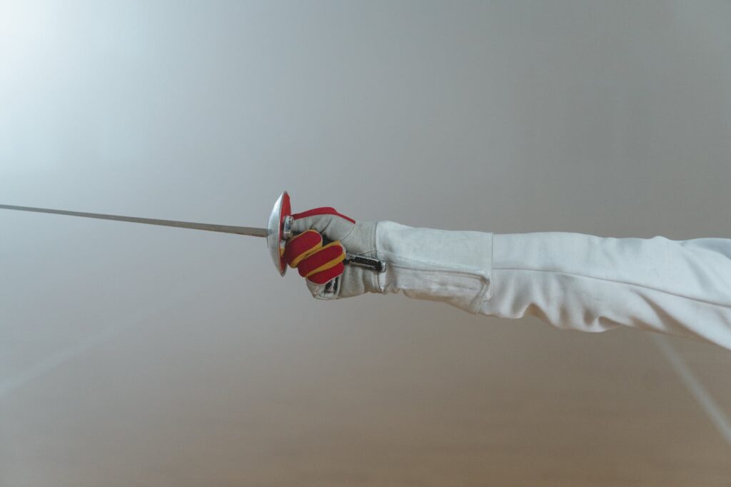 a fencer holding an epee